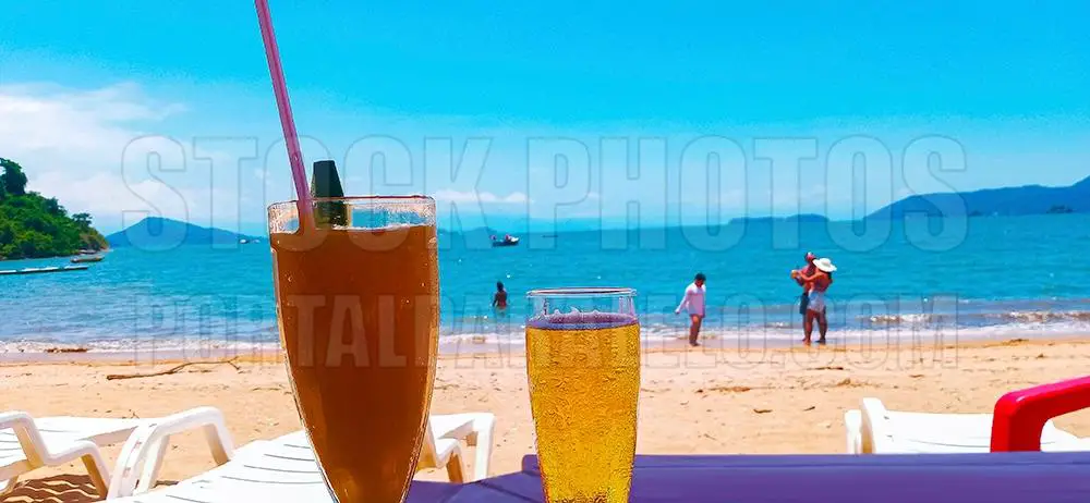 Beer and drink glasses at beach
